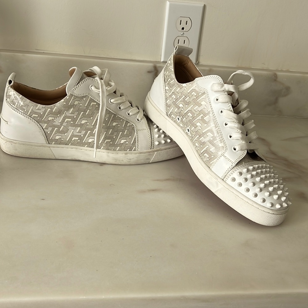 Low top Christian Louboutin sneakers.